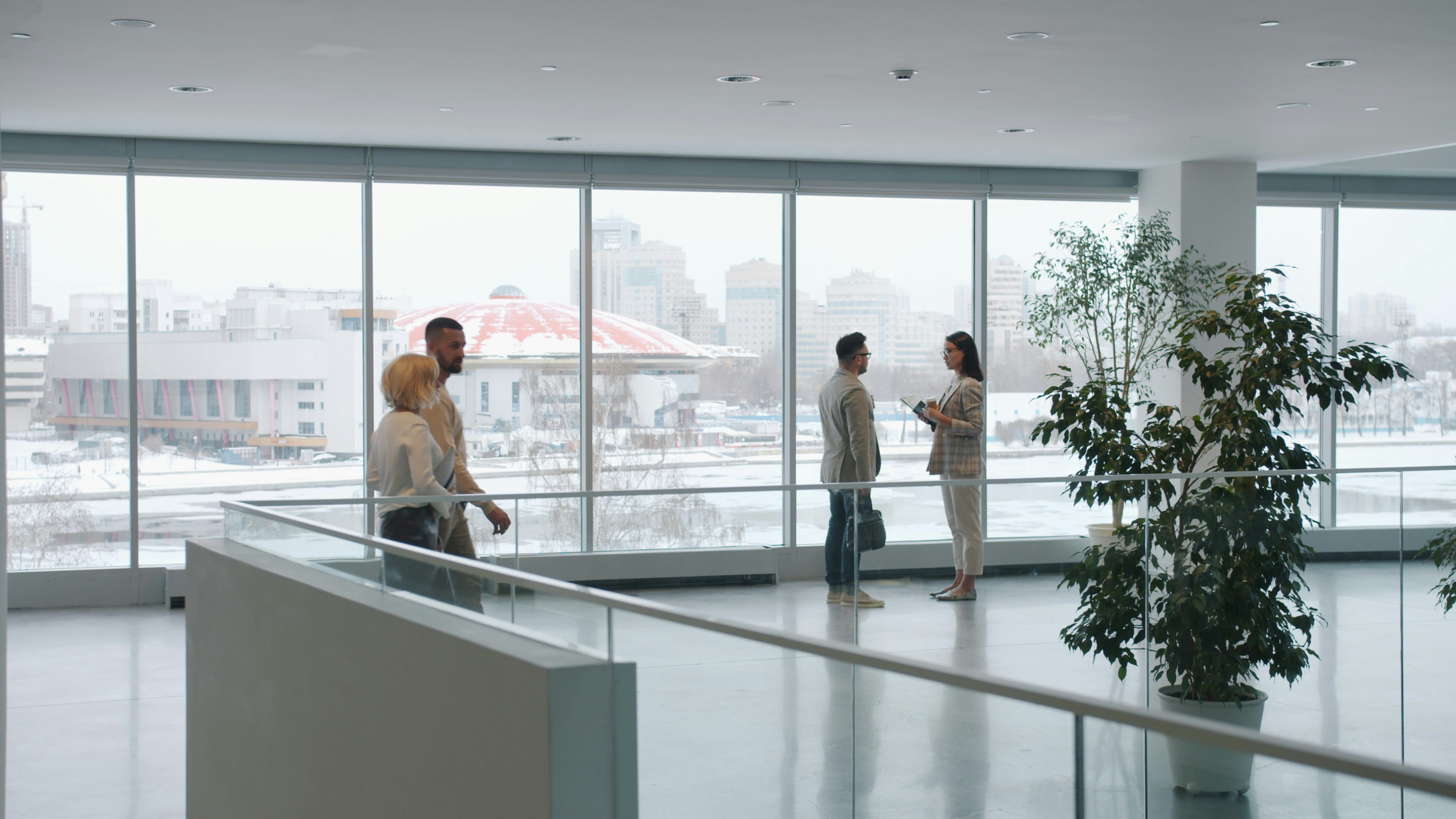 Professionals in a modern occupied commercial building